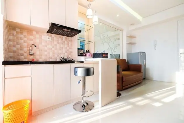 2 Bedrooms at Bassura City Apartment with Mall Access By Travelio