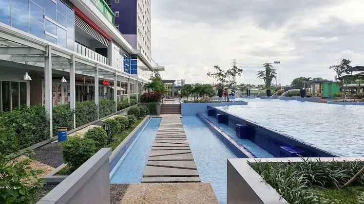2BR Apartment with Sofa Bed at Green Pramuka City