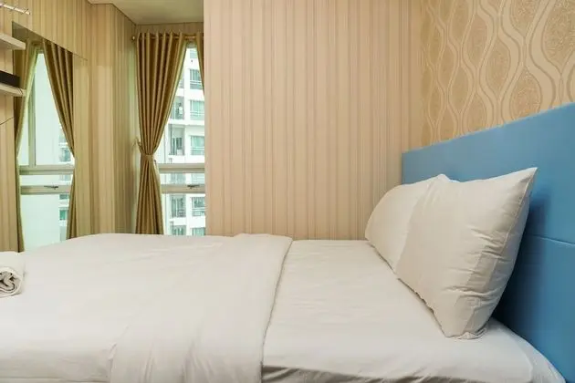 2BR Apartment with Sofa Bed at Woodland Park Residence