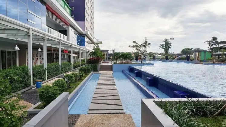 2BR Green Pramuka City Apartment Direct Access to Mall