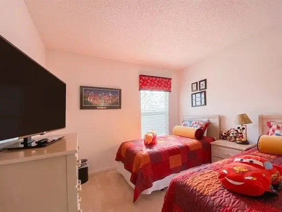 3 Bedroom Home With Private Screened Pool With Rock Waterfall Feature and Gameroom by Florida Dream Homes