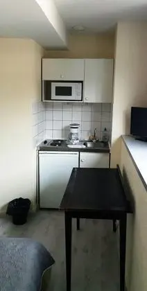 Acacias Apparts Hôtel - Mutfak