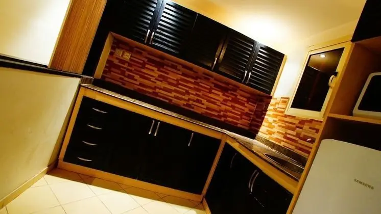 Al Anoud Hotel Apartment - Mutfak