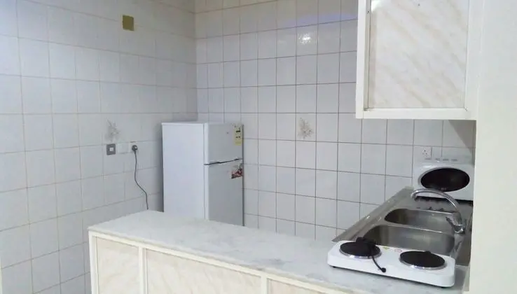 Al Raha Garden Furnished Apartments 2 - Mutfak