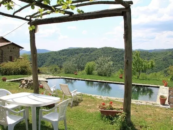 Alluring Holiday Home in Canossa With Pool, Garden Barbecue