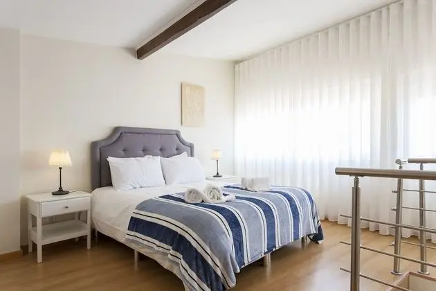 ALTIDO Bright 2BR Apt w/River Views &balcony in Alfama, moments from Santa Apolonia train station
