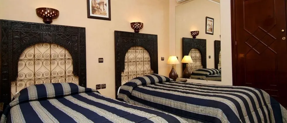 Amani Hotel Suites & Spa - Oda
