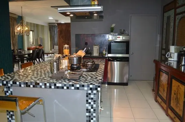 Amisha Vacation Homes - Mutfak