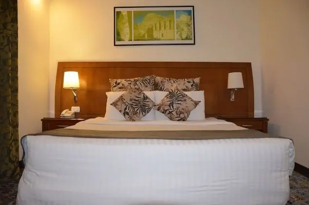 Amra Palace International Hotel - Oda
