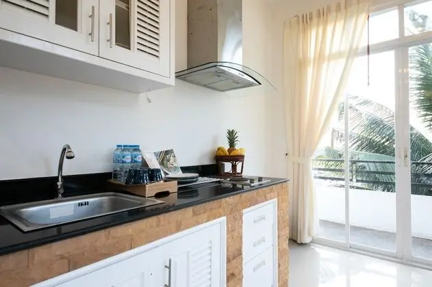 The Ananas Serviced Apartments - Mutfak