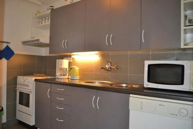 Apartments Holiday Pec - Mutfak