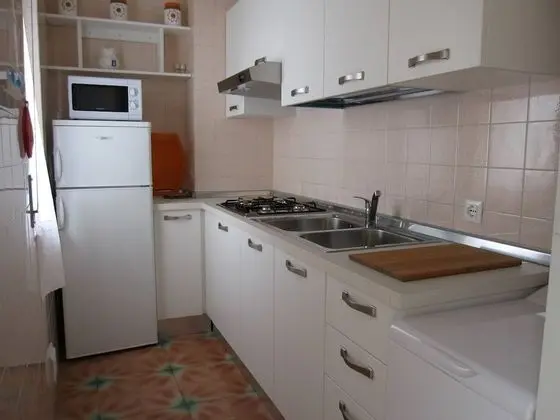 Appartamento Vista Mare Per 4 Persone - Airco - Tv - Mutfak
