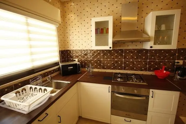 Aqarco Shmaisani Apartment - Mutfak