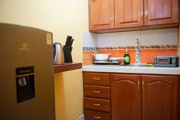 Atahualpa Suites Apartment Rentals - Mutfak