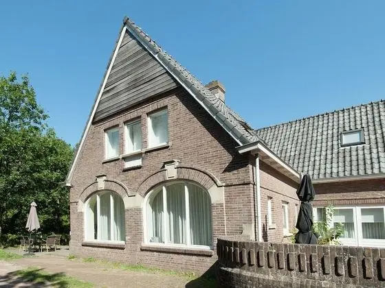 Atmospheric and Modern Apartment in Characteristic Mansion on the Highest Dune