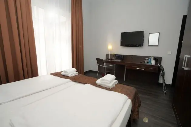 The Atrium Hotel - Oda