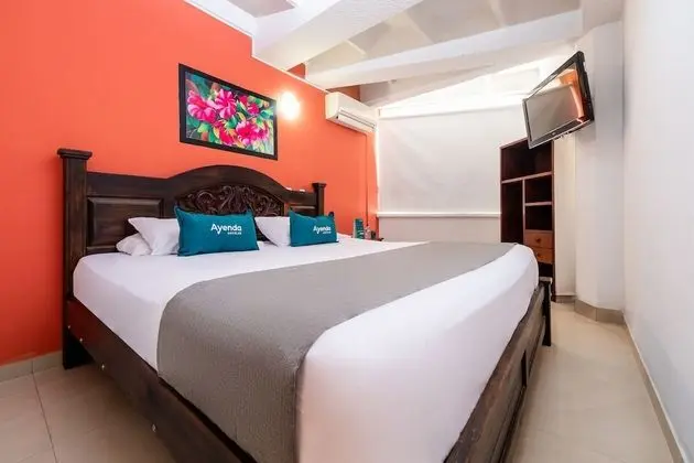 Hotel Ayenda Suramericano - Oda