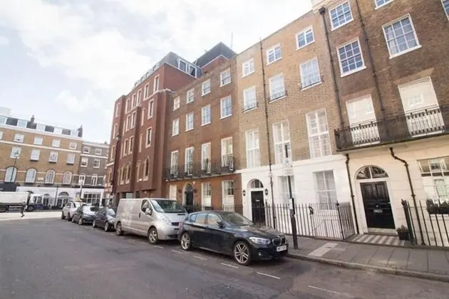 Baker Street Apartments by Flying Butler