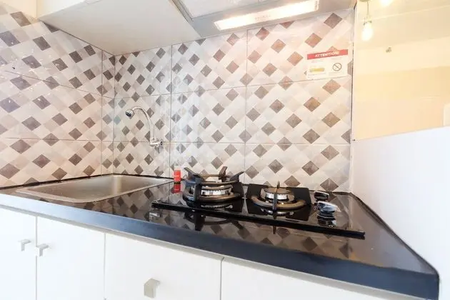 Bassura City Apartment with City View - Mutfak