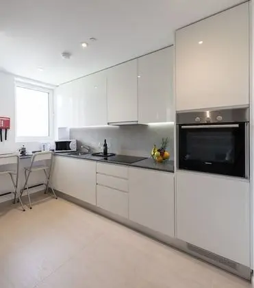 Bentley Holiday Apartments - West One - Mutfak
