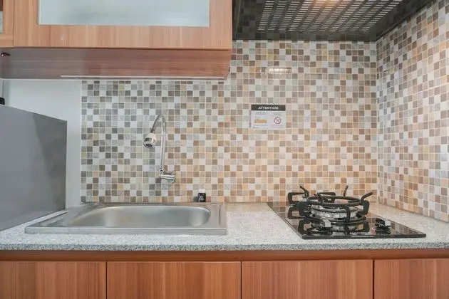 Best Homey Elegant Studio Room at Amethyst Apartment - Mutfak