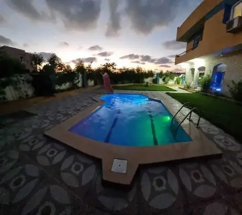 Blue House 4-bed Villa in North Coast Area - Öne Çıkan Resim