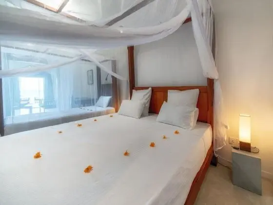 Blue Parrot Beach Villa - Oda