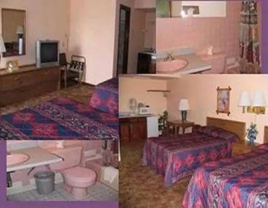 BLUE SPRUCE MOTEL