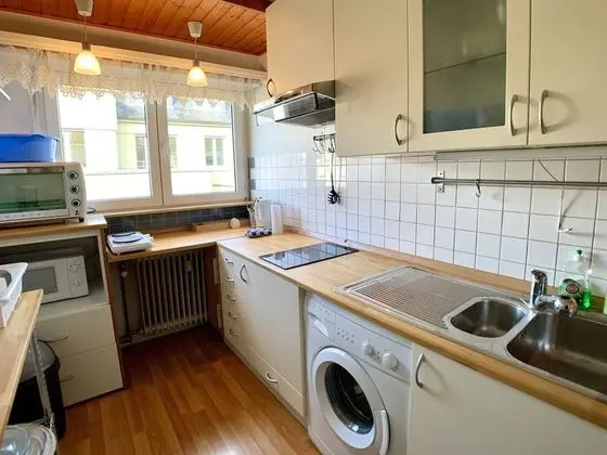 Bright 1BR Apartment City Center - Mutfak