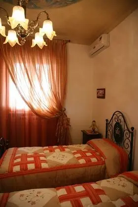 Cali Nitta Bed & Breakfast - Oda
