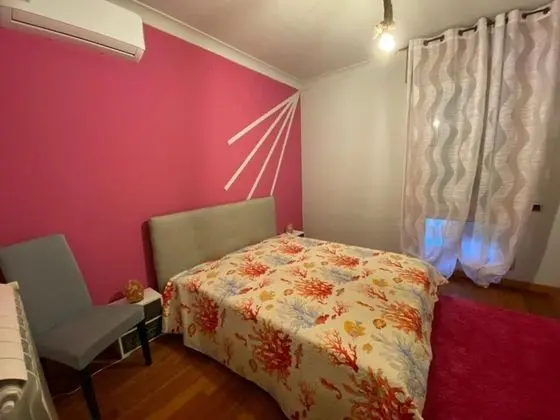 Camera Rosa Appartamento Quadrifoglio