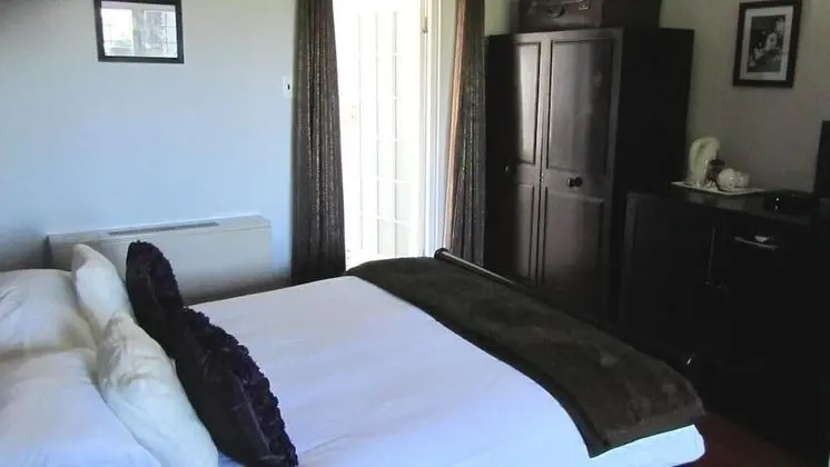 Cape Riviera Guesthouse - Oda