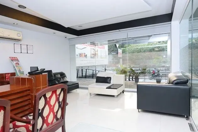 Capital O 10611 Hotel Malabar Illam - Lobi
