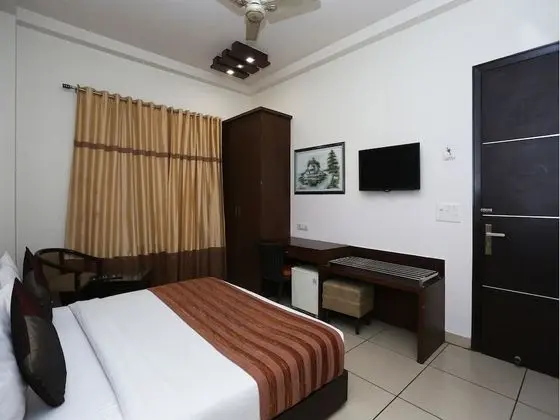 Capital O 1391 Hotel Pushpa Vilas - Oda