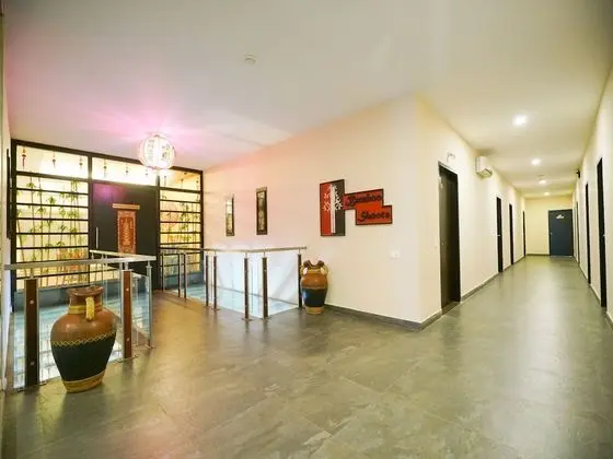 Capital O 15754 Mookkannoor Tourist Home - Lobi