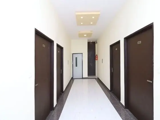 Capital O 27911 Woodland Garden Suites - Lobi