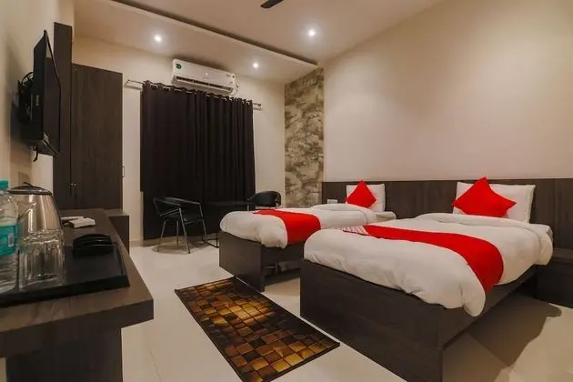 Capital O 36008 Comfort Hotel - Oda
