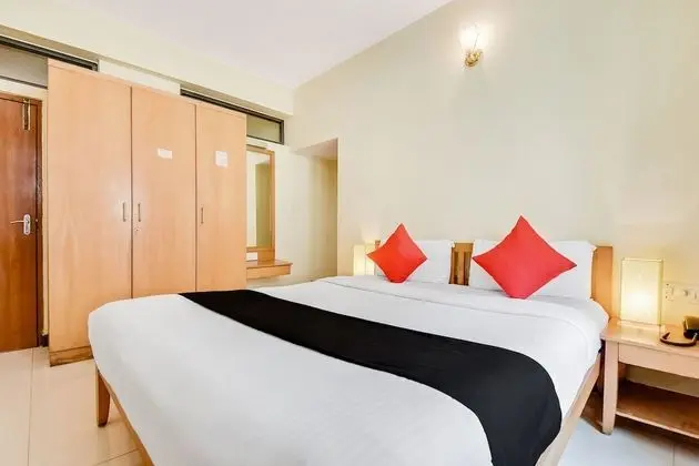 Capital O 49932 Orchard Suites - Oda