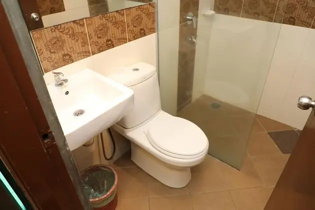 Capital O 90125 Hotel Grand Orchard - Oda