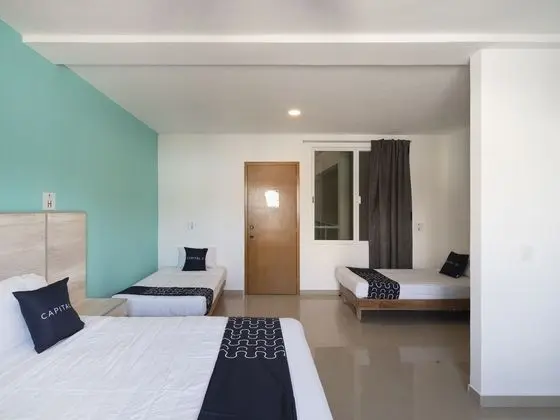 Capital O Hotel Punta Esmeralda - Oda