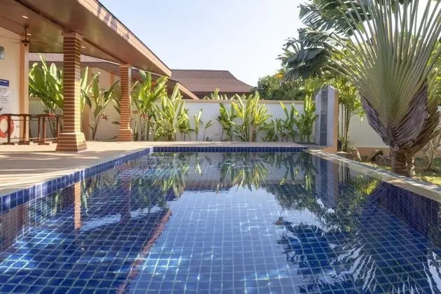 CAPITAL O887 Orchid Garden Villa 2