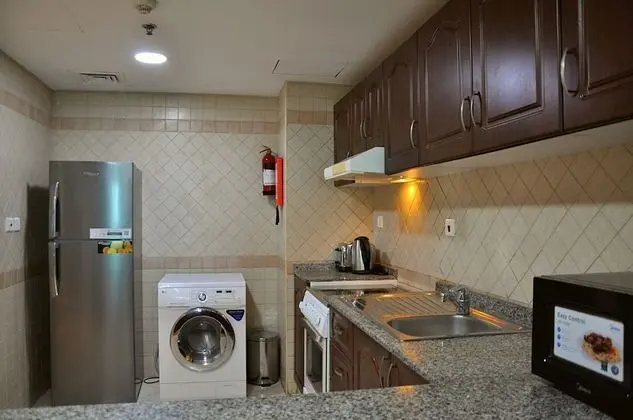 CARE Holiday Homes Apartments Barsha Heights - Mutfak
