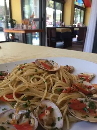 Casa & Ristorante Merano Bibione Spiaggia - Yerinde Yemek