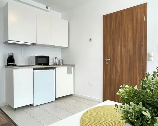 Central Passage Apartments - Mutfak
