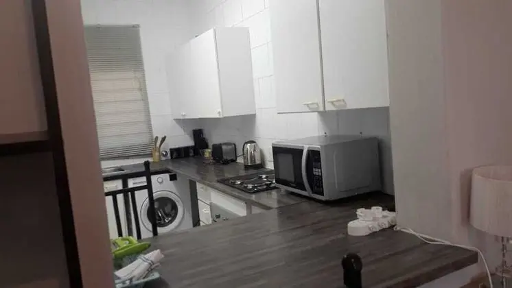 Central Sandton Apartment - Yerinde Yemek