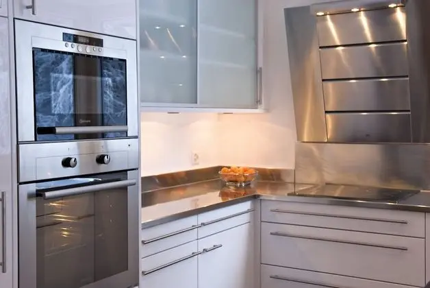Chalet Altesse Serviced Apartments - Mutfak