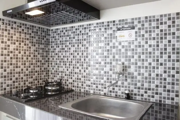 Chic and Comfy 2BR Apartment at Parahyangan Residence near UNPAR - Mutfak