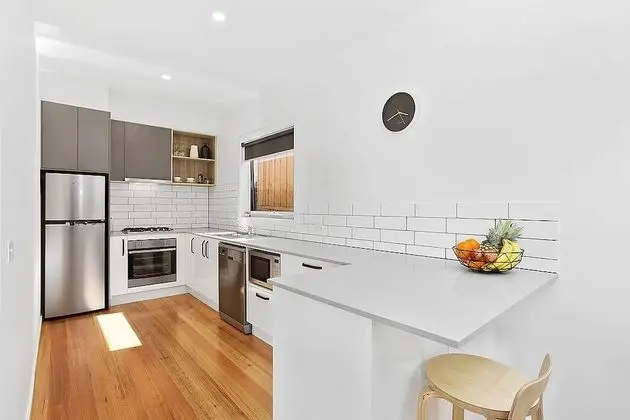 Coastal Vibe Apartments - Mutfak