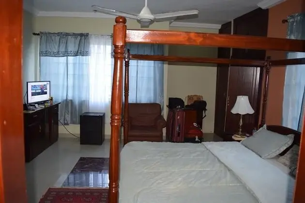 Coconut Pointe Villa & Beach Resort - Oda