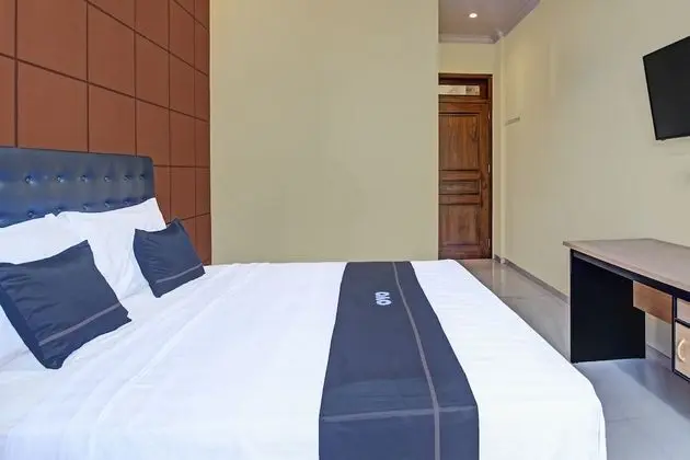 Collection O 91666 Meyli Guesthouse - Oda